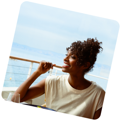 Savoring OLALA! Delight: A woman smiles with anticipation, preparing to enjoy a delicious dish featuring OLALA!'s delectable seafood alternative